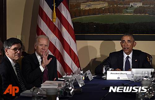 President Barack Obama, joined by Vice President Joe Biden and Treasury Secretary Jacob Lew, convenes his National Security Council at the Treasury Department in Washington, Tuesday, June 14, 2016, to receive an update on the investigation into the attack in Orlando, Florida and review efforts to degrade and destroy ISIL. (AP Photo/Susan Walsh)