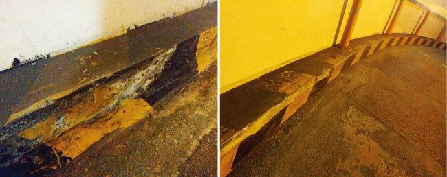 서울 양천구의 한 상가 지하주차장 진입로. 좁은 폭 때문에 차들이 지나가다 벽이나 연석을 긁어 손상돼 있다. [박세준 기자]