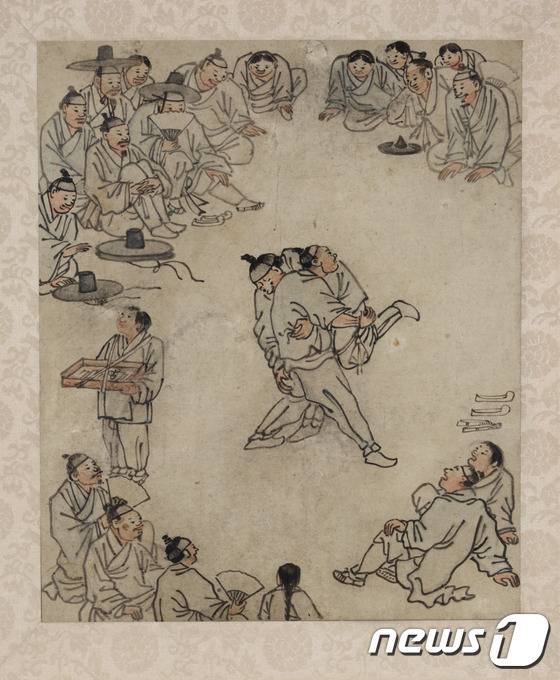 김홍도의 '씨름도' 26.9x22.2cm (국립중앙박물관 제공) © News1