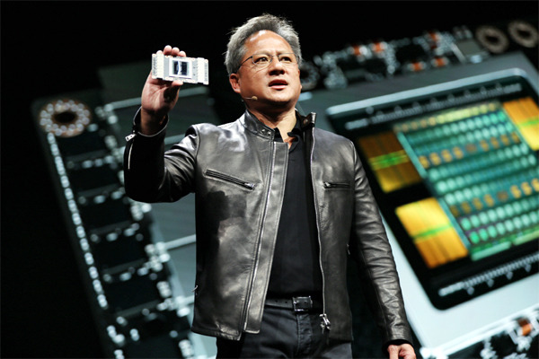 젠슨 황 엔비디아 최고경영자(CEO)가 10일(현지시간) 미국 캘리포니아 새너제이 컨벤션센터에서 열린 `차세대 그래픽 처리장치(GPU) 기술 콘퍼런스`에서 새 GPU `볼타`를 공개하고 있다.  [사진 제공=엔비디아]