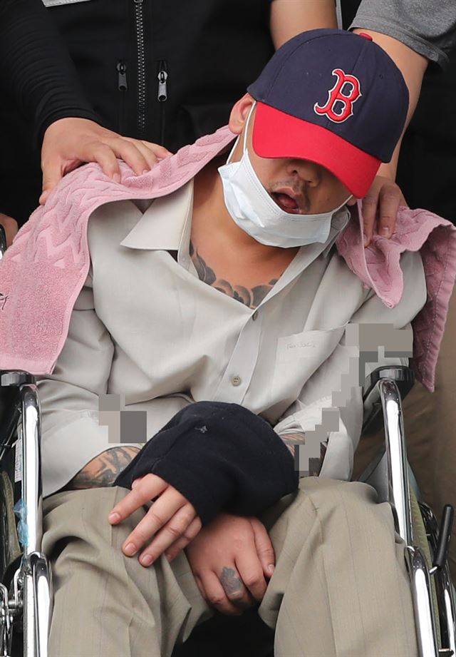중학생인 딸의 친구를 살해하고 야산에 유기한 혐의를 받는 이모씨. 연합뉴스