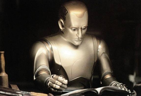 로봇 앤드류가 책을 읽고 있는 장면. 이 영화에서 앤드류는 호기심과 창의력을 가진 존재로 묘사된다.