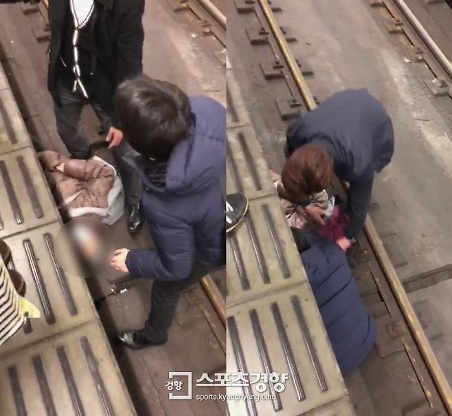 일본 시민들이 선로에 떨어진 노인을 살피는 모습. 이진선 PD dora@kyunghyang.com