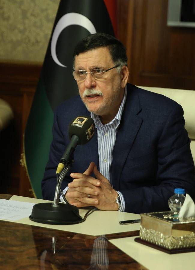 Libya`s unity government Prime Minister Fayez al-Sarraj speaks about the latest situations in the capital Tripoli on August 30, 2018. - At least 27 people have been killed and nearly 100 wounded in several days of fighting between rival militias near the Libyan capital, the health ministry said today. (AFP-Yonhap)