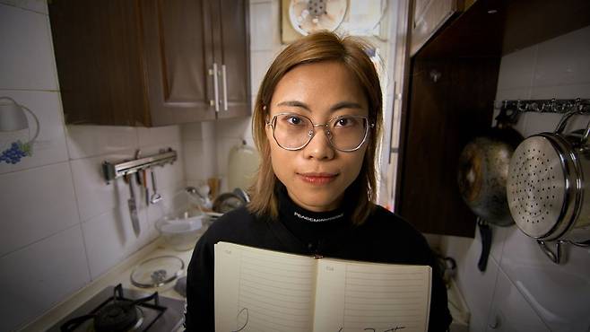 상하이에 사는 판런핑은 다시 출근을 할 수 있어 기쁘다고 했다