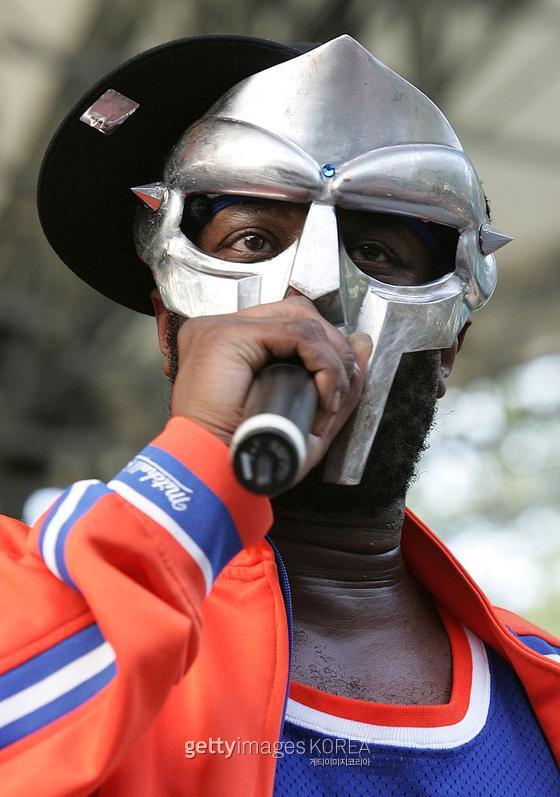 NEW YORK - JUNE 28: Rapper MF DOOM performs at a benefit concert for the Rhino Foundation at Central Park's Rumsey Playfield on June 28, 2005 in New York City. (Photo by Peter Kramer/Getty Images)