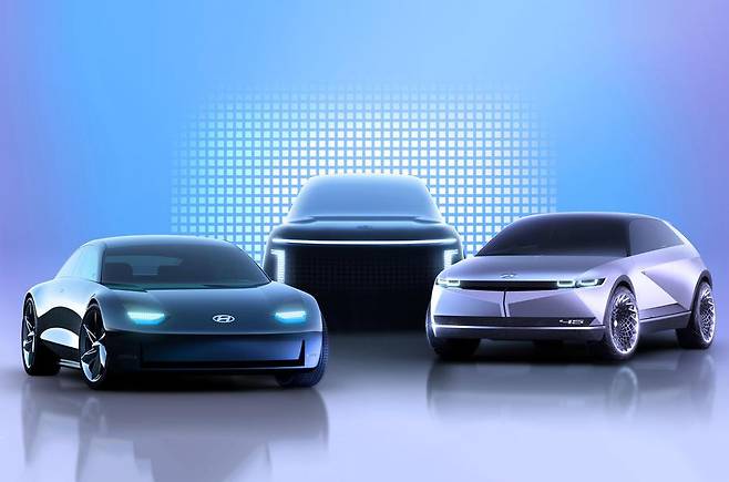 This rendering, provided by Hyundai Motor, shows the IONIQ 6 sedan, IONIQ 7 SUV and IONIQ 5 CUV (from L) to be launched under its IONIQ EV brand by 2024. (Hyundai Motor Group)