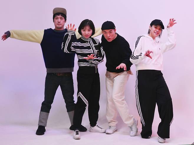 Four members of Band Leenalchi -- (from left) drummer Lee Chul-hee and vocalists Shin Yu-jin, Ahn Yi-ho, Kwon Song-hee -- pose before an interview with The Korea Herald at the office's studio in Seoul on Feb. 19. (Park Hyun-koo/ The Korea Herald)