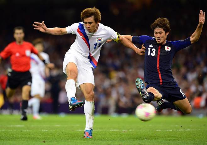 2012년 런던올림픽 일본과 동메달 결정전에서 쐐기골을 터트리는 구자철(왼쪽). [중앙포토]