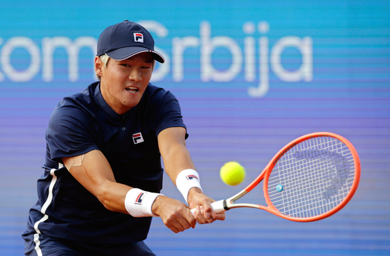 Kwon Soon-woo in action against Novak Djokovic of Serbia during their second round match of the Serbia Open tennis tournament in Belgrade, Serbia, Wednesday. [EPA]