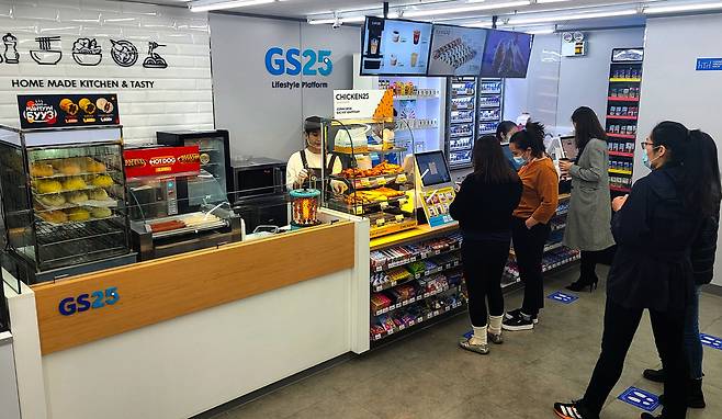 Customers buy items at a GS25 location in Ulaanbaatar, Mongolia on Tuesday. (GS Retail)