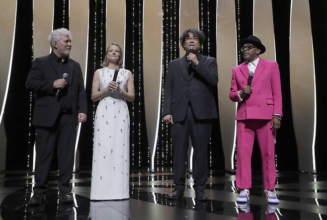 Spanish filmmaker Pedro Almodovar, Hollywood actress Jodie Foster, Bong Joon-ho and Cannes jury leader Spike Lee (from left to right) deliver opening remarks at the 74th Cannes Film Festival on Tuesday (AFP/Yonhap News)