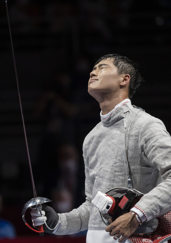 Oh Sang-uk looks disappointed after dropping out of the quarterfinals against Sandro Bazadze of Georgia at Makuhari Messe Hall Chiba, Japan on Saturday. [JOINT PRESS CORPS]