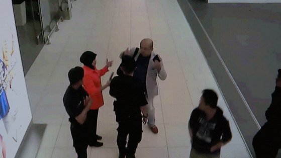 Kim Jong-nam requesting help from an airport receptionist after he was poisoned. [THE COOP]