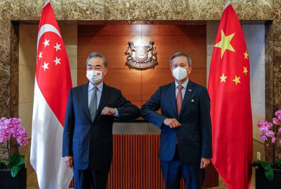 Wang Yi, Chinese state councilor and foreign minister, meets with Singapore’s Minister for Foreign Affairs Vivian Balakrishnan on Monday. (provided by Singapore’s Ministry of Foreign Affairs)