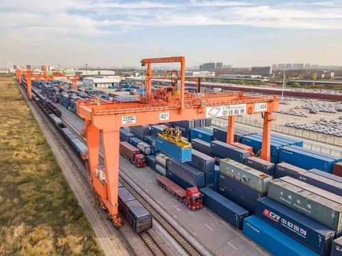 With a China-Europe freight train loaded with auto parts, electronic products, daily necessities and epidemic prevention materials leaving Wujiashan railway station in Dongxihu District of central China's Wuhan.