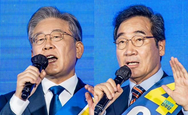 더불어민주당 대선 경선 후보인 이재명 경기도지사(왼쪽)와 이낙연 전 대표가 25일 오후 광주 서구 김대중컨벤션센터 1층 다목적홀에서 열린 광주·전남 지역경선 합동연설회에서 정견발표하고 있다. ⓒ 연합뉴스