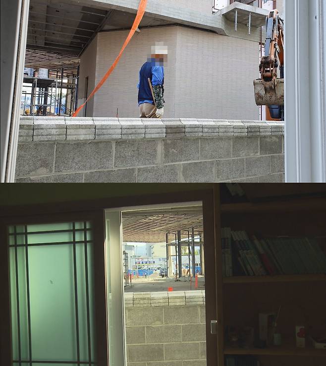 피해 호소 가정 방에서 바라본 ‘드라이브 스루’ 차량 진입로. 공사 터에 1m 이상 성토 작업을 해, 도로가 눈높이까지 올라온 모습이다.