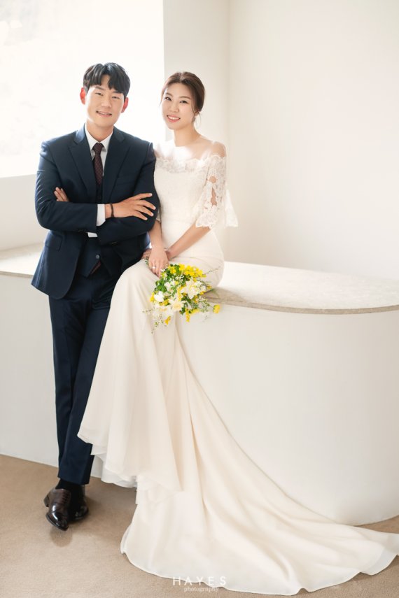 지난 20일 결혼식을 마친 신용구-김희정 부부.