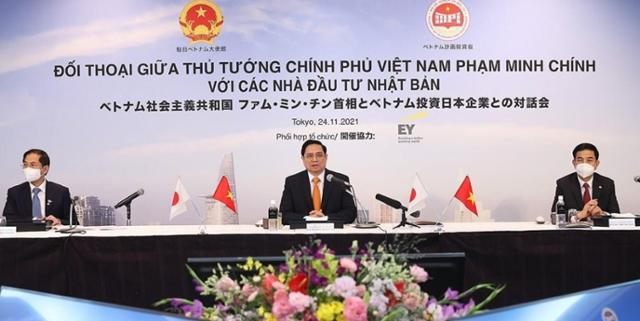 지난 24일 팜민찐(가운데) 베트남 총리가 일본 도쿄에서 열린 현지 기업인들과의 간담회에서 발언하고 있다. 베트남국영통신사(VNA) 캡처