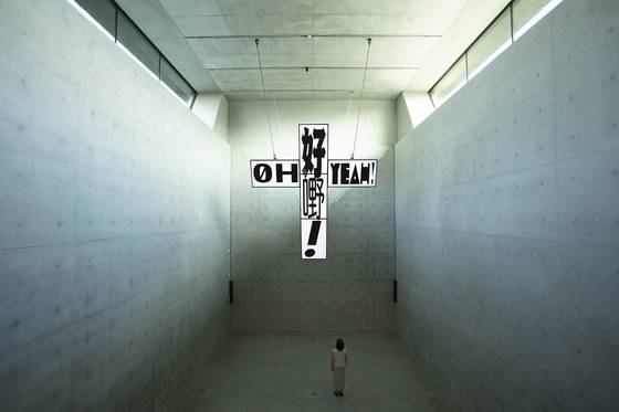 ″Crucified TVs - Not a prayer in Heaven″ by the Seoul-based artist duo Young-Hae Chang Heavy Industries now on view at the Focus Gallery in M+. [M+]