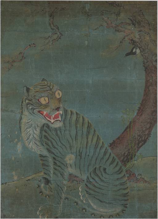 국립중앙박물관이 소장 중인 조선시대 민화 까치호랑이(덕수 2506). 우리나라 호랑이 그림을 대표하는 그림인 까치호랑이는 영물인 까치와 호랑이를 함께 그려넣어 새해 나쁜 것을 쫓아내고 기쁜 소식이 들어오길 바라는 마음을 담고 있다. 국립중앙박물관 제공