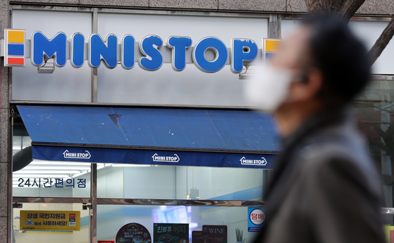 A man walks past a Ministop branch in Seoul [NEWS1]
