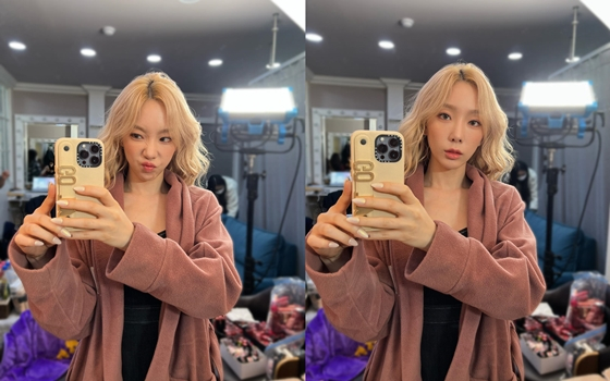 Taeyeon posted several photos on her Instagram account on Monday.The photo shows a cake received from a brand.In the photo, Taeyeon is wearing a black mini dress, with long blonde straight hair making her beauty even more prominent, especially a fairy-like visual in Fairytale.Meanwhile, Taeyeon released INVU on February 14th, and will appear as a grand master on Mnet Queendom 2, which will be broadcast on the 31st.