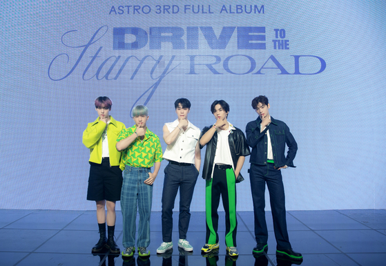 Boy band ASTRO, excluding MJ who enlisted for his mandatory military service earlier this month, pose for cameras during Monday's press event for its third full-length album ″Drive to the Starry Road″ (2022). [FANTAGIO]
