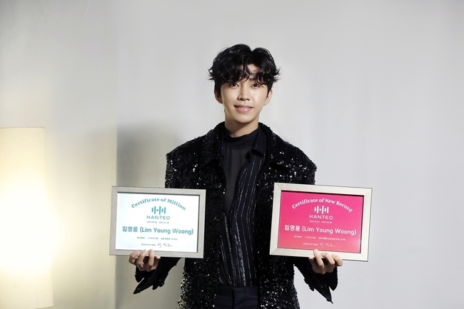 Singer Lim Young-woong thanked the heroic era for making a miraculous record.On May 24, Lim Young-woong, who won the official first certification of Hanter chart through the official SNS channel, was released.Lim Young-woong in the photo is drawing attention with his brilliant visuals, while he is smiling mildly with a new record of Hanter chart (a new record in the first-ever sales man Solo category) and a Million Certification plaque, which fans have presented to him.Lim Young-woong surpassed 1.1 million copies in the initial sales volume of his debut Regular album IM HERO (Im hero), achieving the record of No. 1 sales volume of the first solo singer album of all time, becoming the official record holder of the first solo singer sales volume.In addition, it ranked ninth in the ranking of the first-time K-pop sales, proving its popularity that it can not follow.In particular, Lim Young-woongs record is meaningful because the number of overseas fans is less than that of idols due to the nature of the genre, and it is meaningful that it has achieved pure domestic demand without separate marketing such as overseas purchase and fan signing.Lim Young-woongs new record certification card is an official certification of the Solo artist division, and the Million Certification plaque means that it will achieve more than 1 million copies of the initial sales volume.Lim Young-woong, who has been writing a new history breaking his record, is loved by songs including Regular 1st album title song Can I Meet Again, and is meeting fans with the national tour concert IM HERO, which is sold out all the time at the same time as ticket opening.
