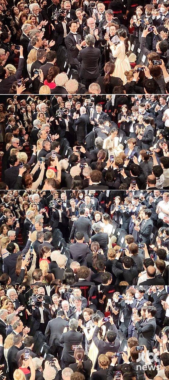 제75회 칸국제영화제(Cannes Film Festival·이하 칸영화제) 경쟁부문 초청작 '헤어질 결심'이 23일 오후 6시(현지시간) 뤼미에르 대극장(GRAND THEATRE LUMIERE) 월드 프리미어상영 후 8분 기립박수를 받았다. 박찬욱 감독과 탕웨이, 박해일은 관객들에게 인사하며 진심 어린 감사의 뜻을 표했다. | 칸(프랑스)=박세완 〈사진=JTBC엔터뉴스〉