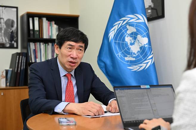 UN Assistant Secretary-General and Director of the UNDP Bureau for Policy and Programme Support Haoliang Xu poses during an interview with The Korea Herald in Seoul on May 24. (Im Se-jun/The Korea Herald)