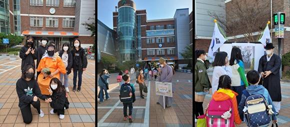 천안신부초 오영창 교사가 개천절과 석가탄신일, 임시정부수립일 (사진 왼쪽부터)에 기념일 관련 의상을 입고 기념일에 대해 설명하고 있다.  [사진=천안교육지원청]