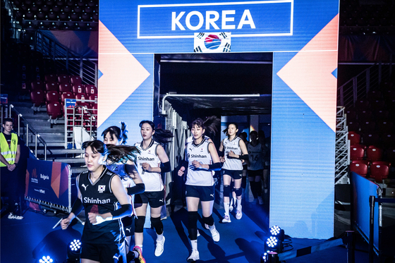 The Korean national women's volleyball team enters the court to play a Volleyball Nations League match against China on Sunday in Sofia, Bulgaria. [FIVB]