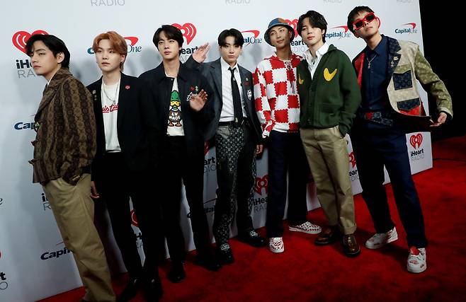 BTS poses at the carpet during arrivals ahead of iHeartRadio Jingle Ball concert at The Forum, in Inglewood, California, US on Dec. 3, 2021. (Reuters-Yonhap)