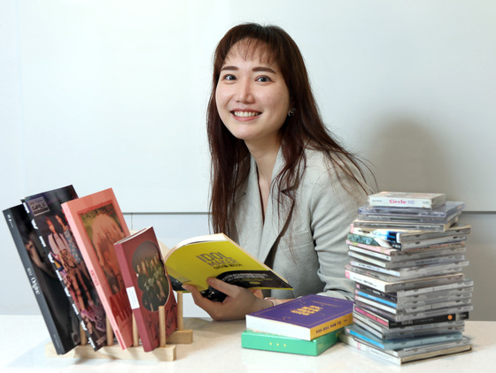 Pop music critic and journalist Park Hee-a poses for photos after an interview with the Korea JoongAng Daily at a cafe in eastern Seoul on July 18. [PARK SANG-MOON]