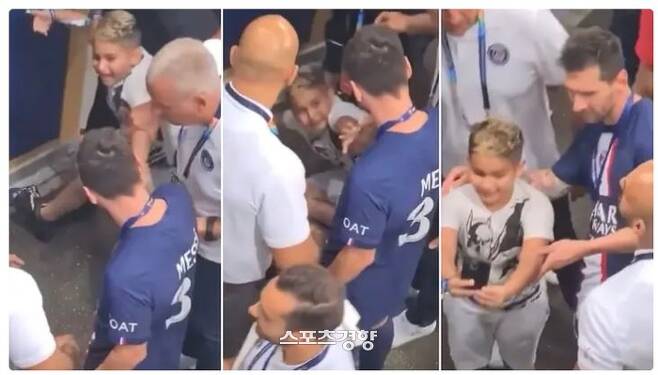 PSG 리오넬 메시가 1일 슈퍼컵 우승 뒤 자신에게 다가오다 보안요원에게 끌려가던 어린이 팬을 데려와 함께 사진을 찍어주고 있다. 스포츠바이블 캡처