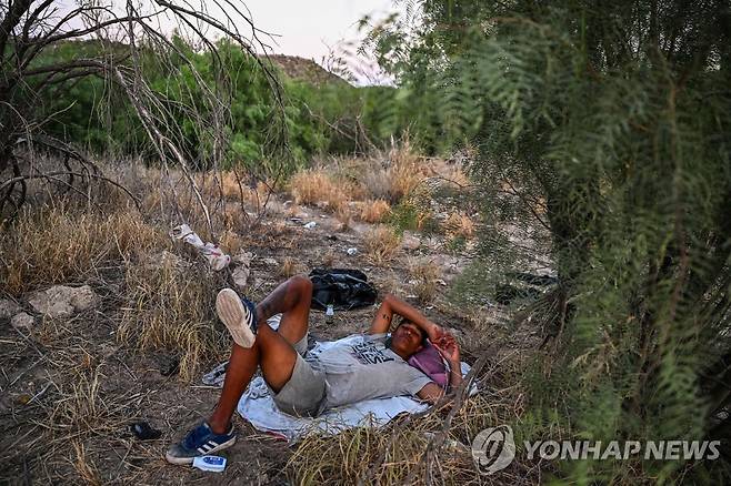 미국으로 넘어온 중남미 이주민 [AFP 연합뉴스 자료사진. 재판매 및 DB 금지]