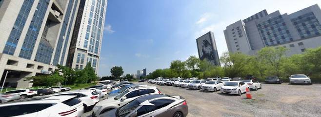 현재 주차장으로 사용되고 있는 서울시 영등포구 여의도동 61-1번지 부지[사진=네이버 거리뷰]