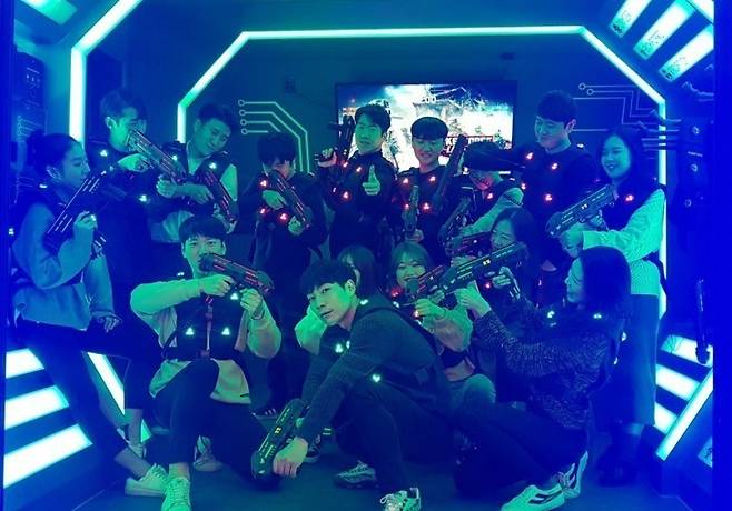 Visitors pose for a photo at Laser X in Mapo-gu, western Seoul. (Laser X's Instagram)