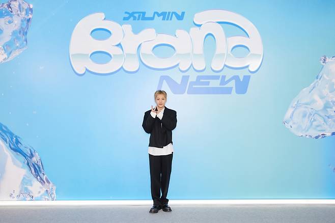 Xiumin of boy band EXO poses during an online press conference held for his first solo album, “Brand New,” on Monday. (SM Entertainment)