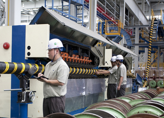 LS Cable & System engineers at the company's production plant for submarine cables [LS CABLE & SYSTEM]