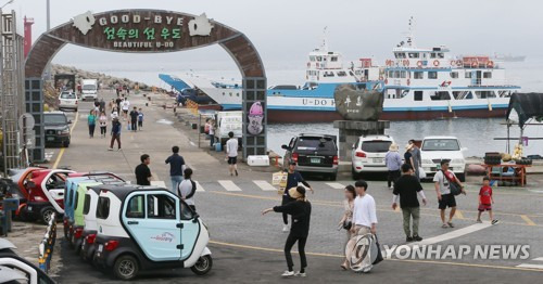 제주시 우도면 내 주차돼 있는 삼륜차들 [연합뉴스 자료사진]