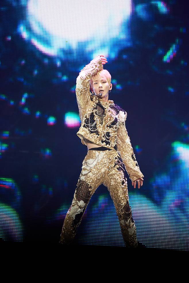 SHINee’s Key performs during his solo concert, “G.O.A.T. (Greatest Of All Time) In The Keyland,” at Jangchung Arena in central Seoul on Saturday. (SM Entertainment)