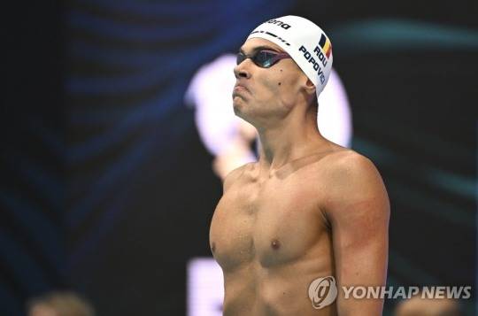아레나 수영 모자를 쓴 러시아의 세계적인 수영 스타 다비드 포포비치. [AP=연합뉴스]
