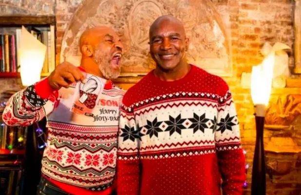 마이클 타이슨(왼쪽)과 에반더 홀리필드의 모습. [더선 홈페이지 캡처]