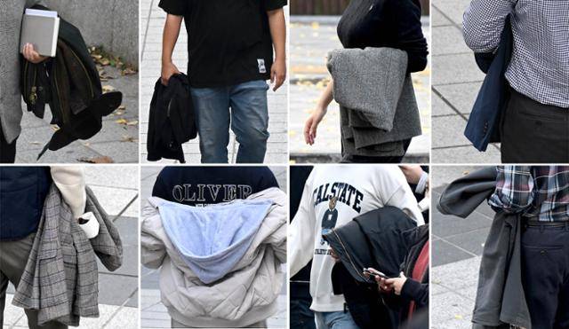 첫눈이 내릴 정도로 추위가 본격적으로 시작된다는 소설을 하루 앞둔 21일 아침 기온이 3도에서 12도로 평년기온을 크게 웃돌며 따뜻한 가을 날씨가 이어지고 있다. 이날 서울 청계천을 찾은 직장인들이 겉옷을 벗고 가벼운 옷차림으로 산책을 하고 있다. 서재훈 기자