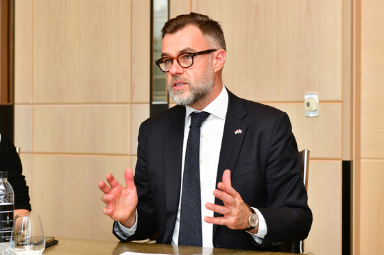 Franz Fayot, Luxembourg’s minister of the economy, talks at a round table interview at the Four Seasons Hotel in Jongno District, central Seoul, on Monday. [MINISTRY OF THE ECONOMY]