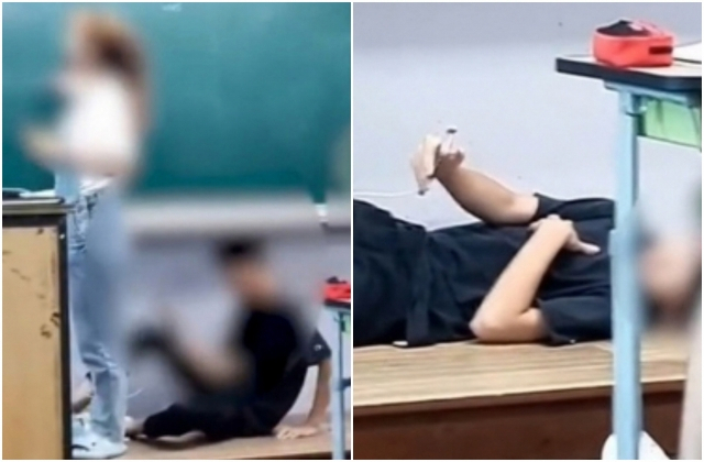 충남 홍성에서 한 중학생이 수업 중 휴대전화기를 들고 교단 위에 누워 있는 모습의 영상이 온라인상에 퍼져 논란이 됐다. [온라인 커뮤니티]