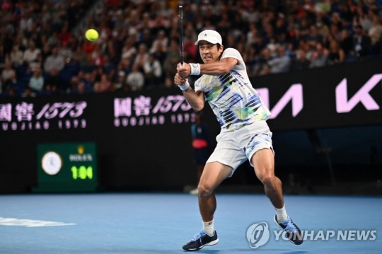 나달을 꺾은 멕도널드[AFP=연합뉴스]